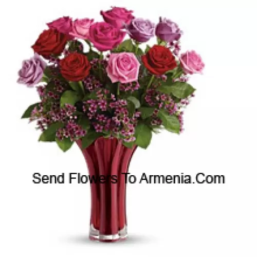 11 Mixed Colored Roses With Some Ferns in A Vase