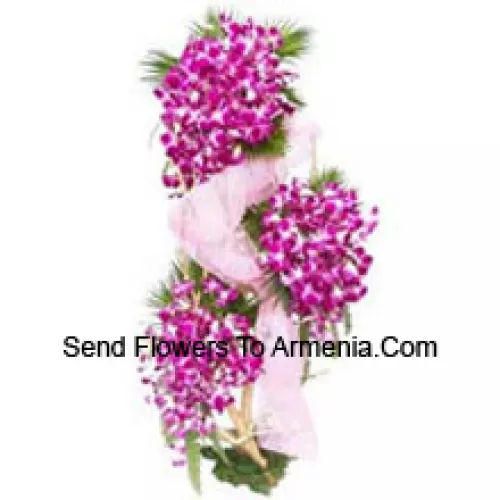 A 4 Feet Standing Arrangement Of Orchids