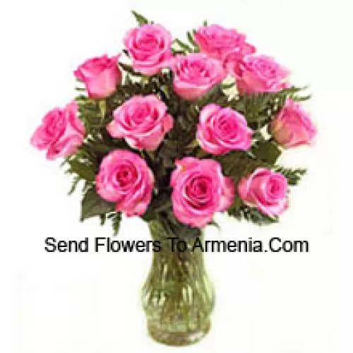 11 Pink Roses With Some Ferns In A Vase