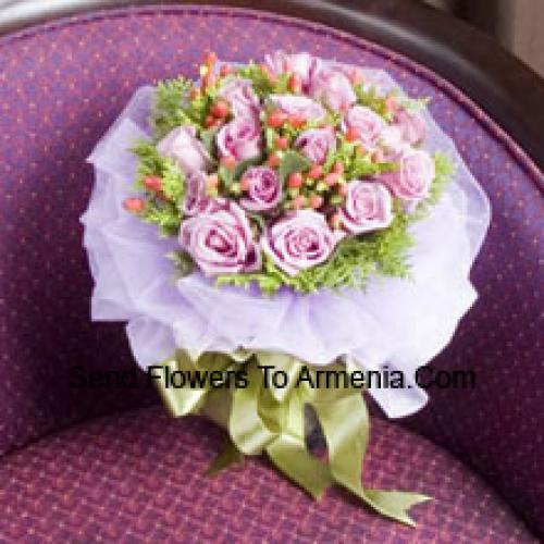 11 Light Pink Wrapped Roses