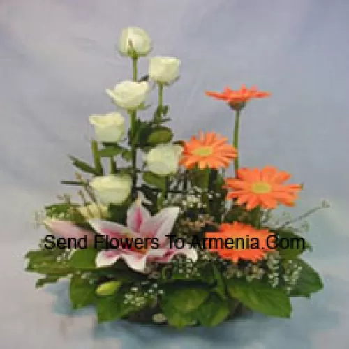 Basket Of Assorted Flowers Including Lilies, Roses And Daisies