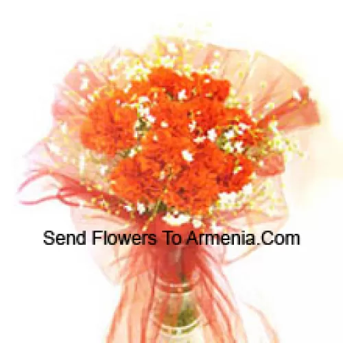 11 Orange Carnations With Some Ferns In A Vase