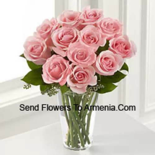 11 Pink Roses With Some Ferns In A Vase