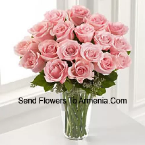 19 Pink Roses With Some Ferns In A Vase