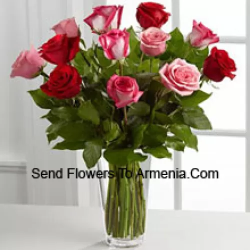 5 Red, 4 Pink And 4 Dual Toned Roses With Seasonal Fillers In A Glass Vase