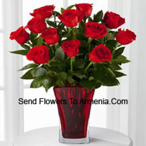 11 Red Roses With Some Ferns In A Vase