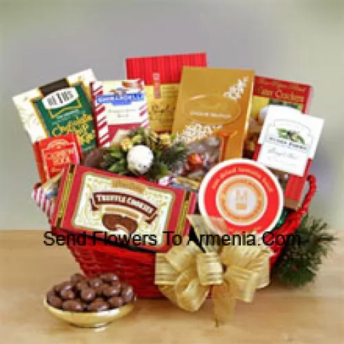 This handsome red oval basket comes decorated with a big bow to make a great presentation. Inside are many reasons to smile as she sample the savory and sweet selection: crackers, cheese, Cashew Roca, truffle cookies, mocha almonds, chocolate chip cookies, Lindt truffles, Ghirardelli almond chocolate bar, and English tea cookies. (Please Note That We Reserve The Right To Substitute Any Product With A Suitable Product Of Equal Value In Case Of Non-Availability Of A Certain Product)