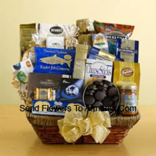 We've packed a wicker basket with a delightful assortment of gourmet foods, all arranged to make a great impression. Your mom is sure to appreciate this gift and will enjoy everything packed inside including tortilla chips, salsa, cheese sticks, brie cheese, water crackers, smoked salmon, pistachios, almonds, popcorn, pretzels, cheese swirls, Jelly Belly jelly beans, assorted Ghirardelli chocolates, wafer cookies, a tin of chocolate-covered sandwich cookies, a bag of Ghirardelli squares, and biscotti. (Please Note That We Reserve The Right To Substitute Any Product With A Suitable Product Of Equal Value In Case Of Non-Availability Of A Certain Product)